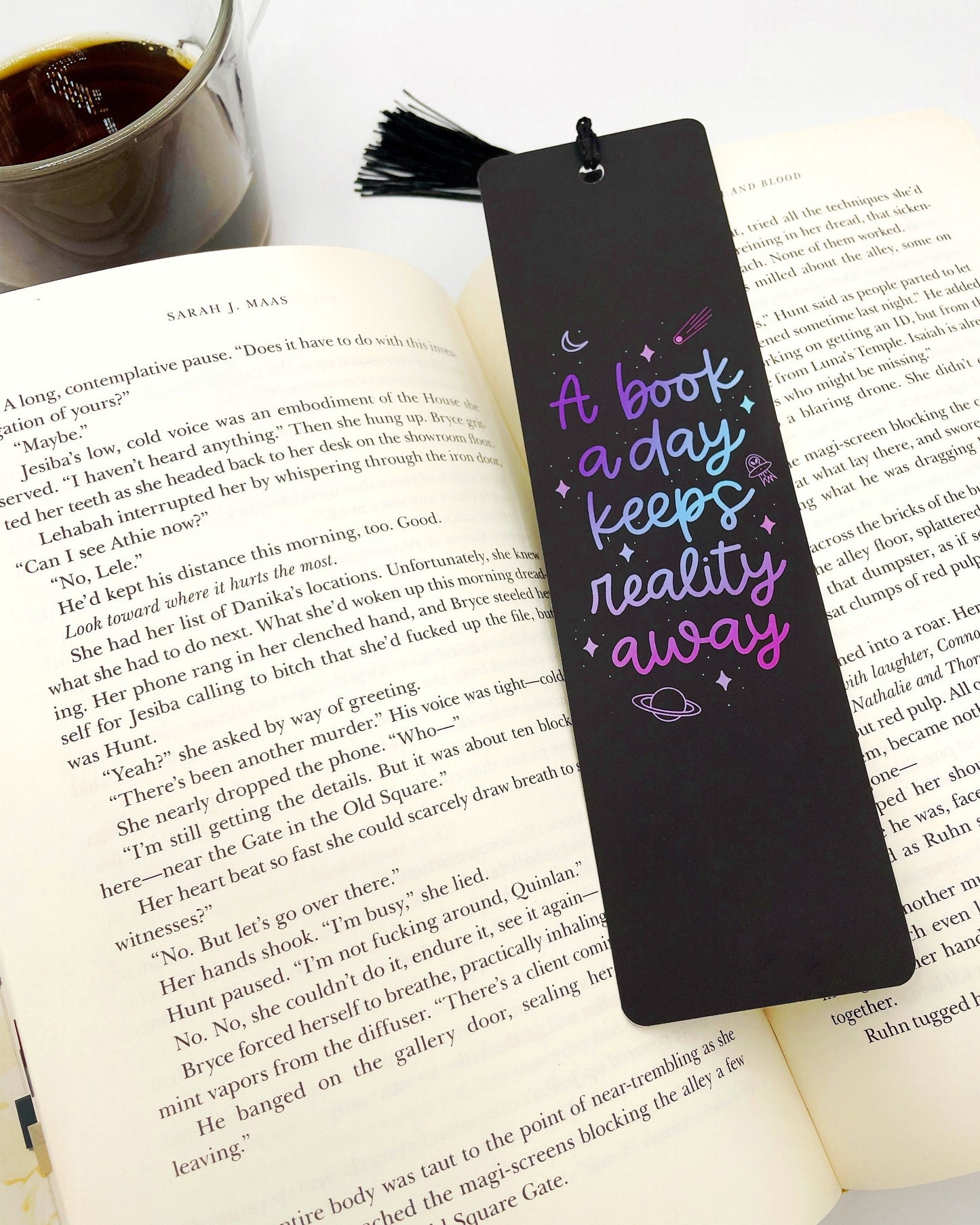 A book a day keeps reality away bookmark